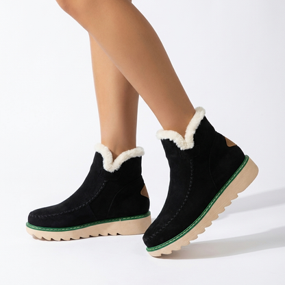 Aurelle boots worn in white studio