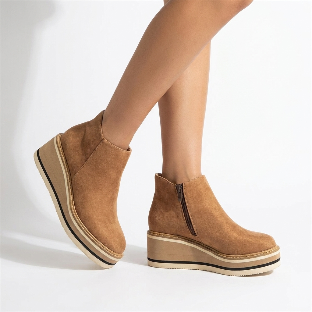 Savana boots worn in white studio